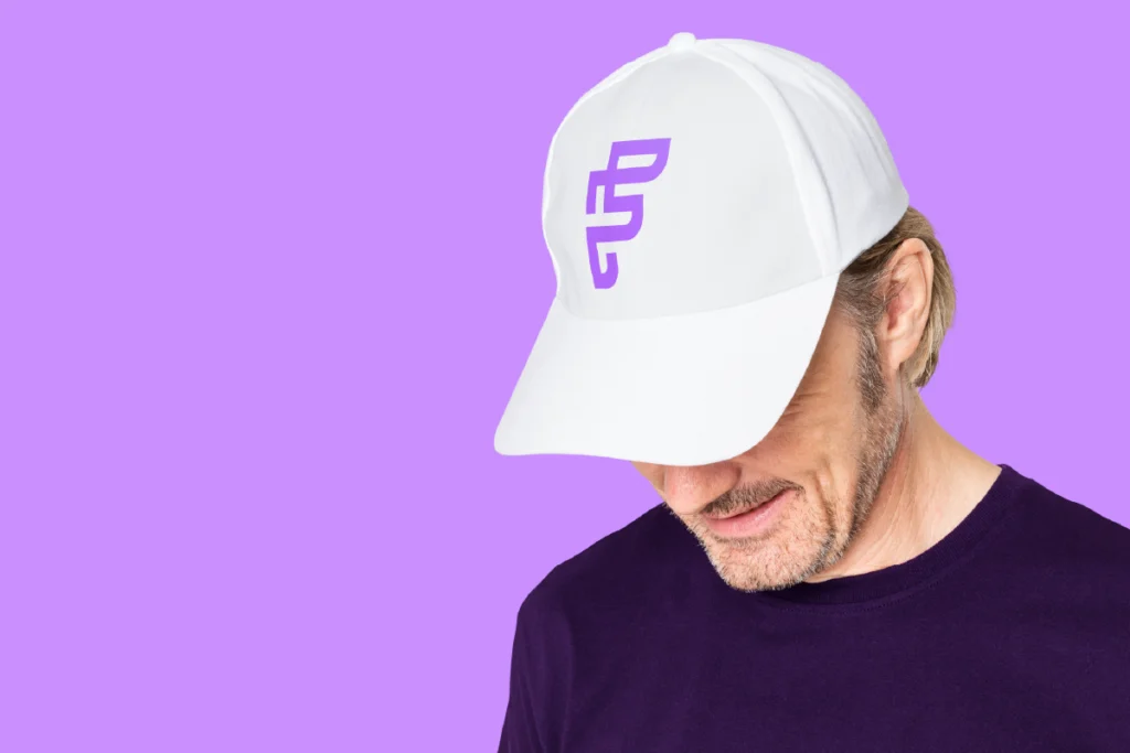 Monogram logo on cap example for the blog post Monogram Logo for Startups: Is It the Best Choice in 2026?